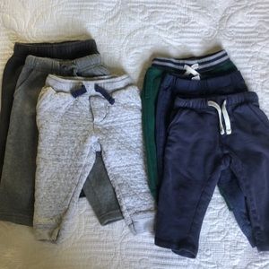 Bundle of 6 pairs of boys sweat pants size 12-18 months.